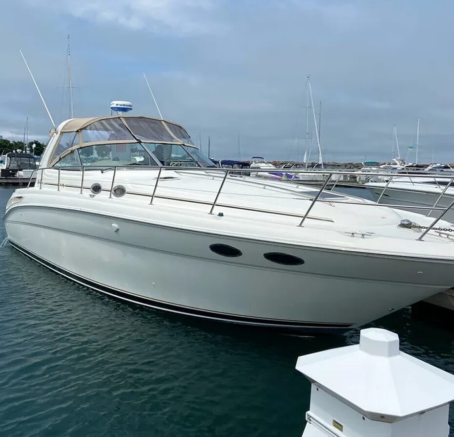 White yacht moored in harbor