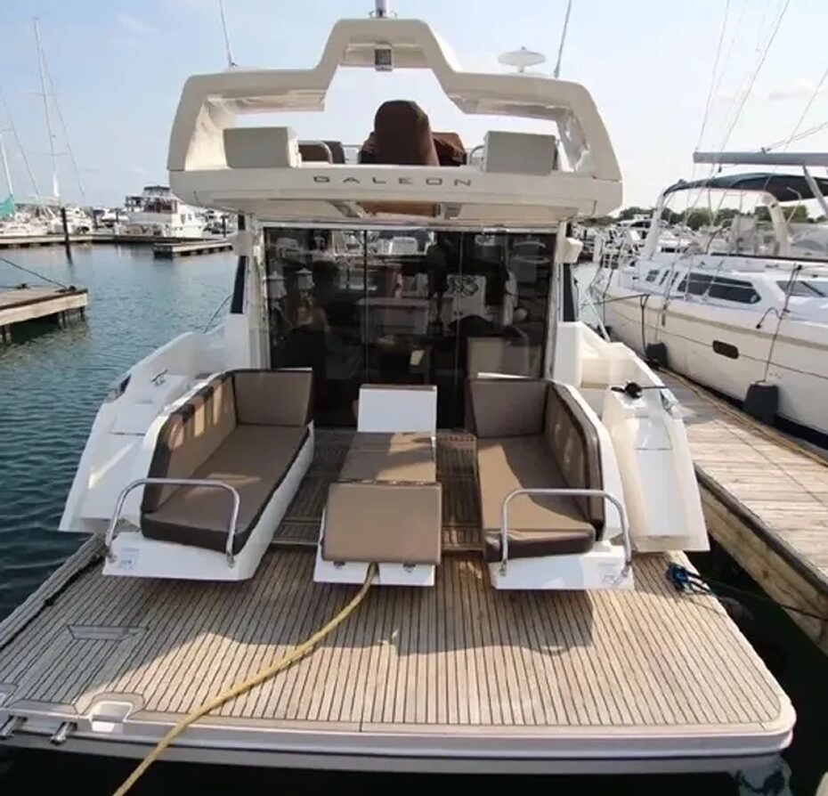 Yacht with open deck at marina