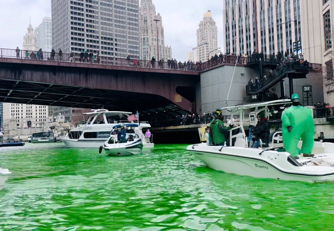 City bridge over green-dyed water