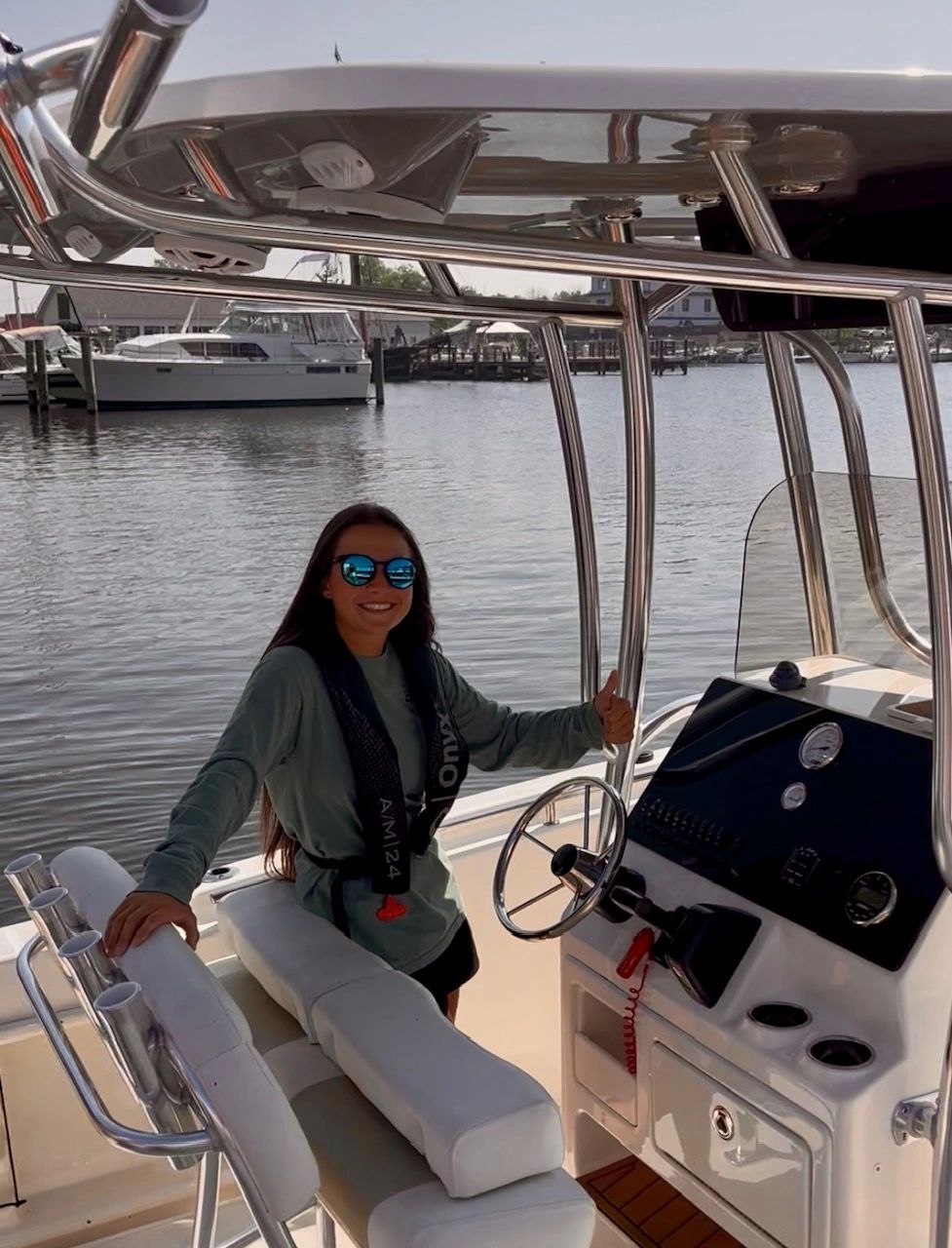 Smiling woman on a boat