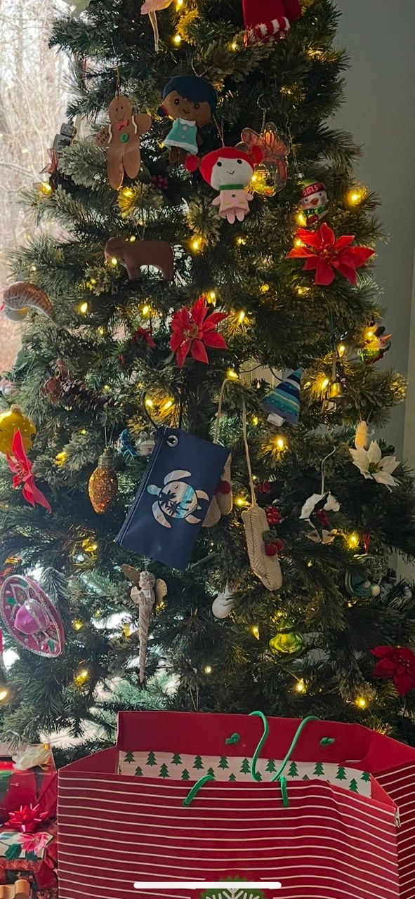 Festive tree with lights and gifts