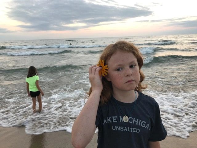 Sunset beach scene with children