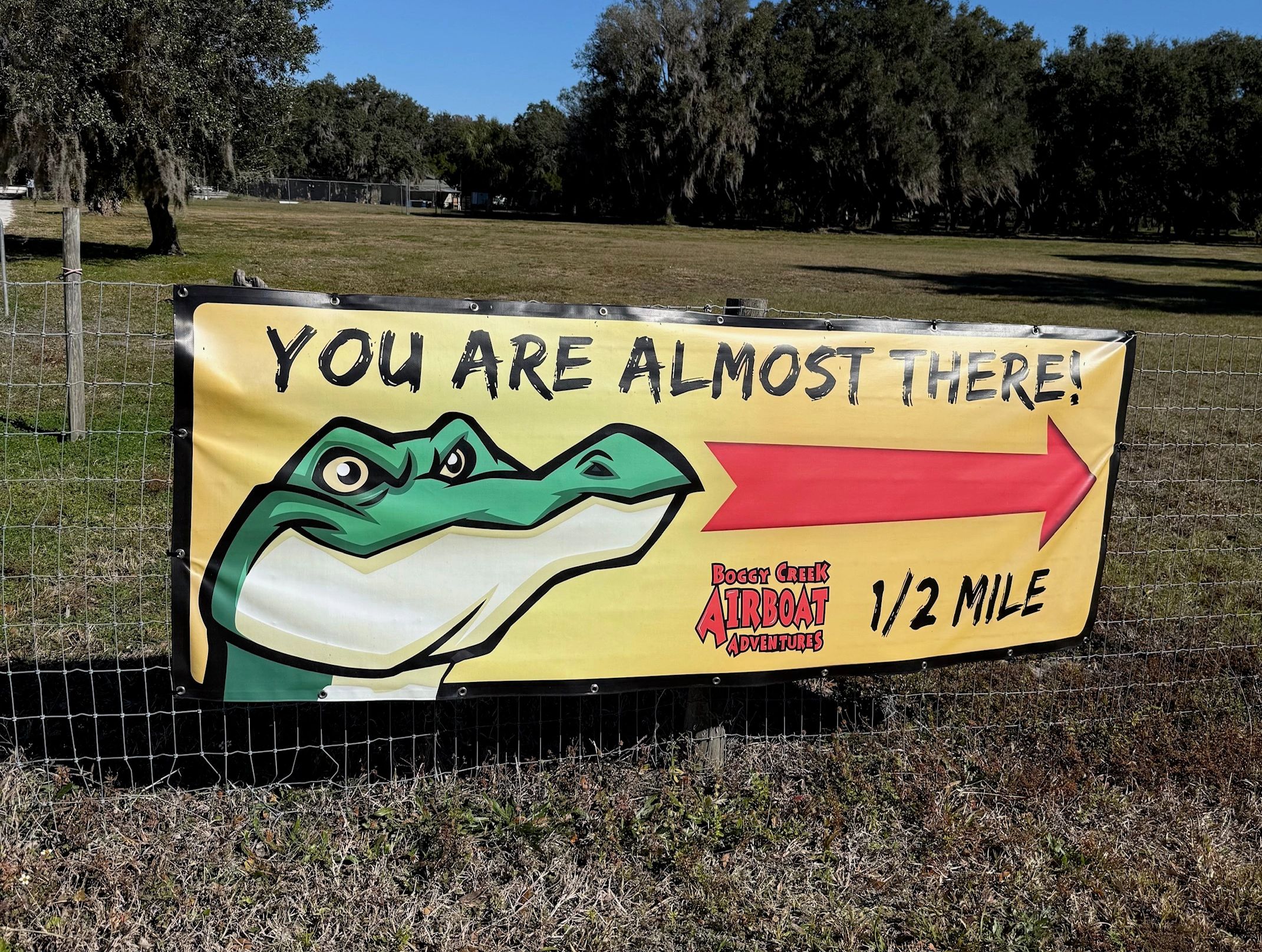 Amusement park sign directing visitors