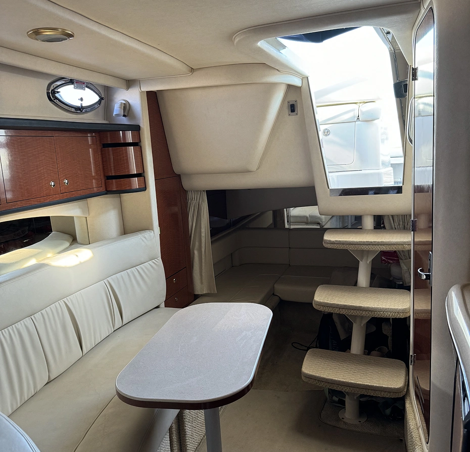 Interior of a 350 Coupe, with a studio couch, desk, and cabinetry