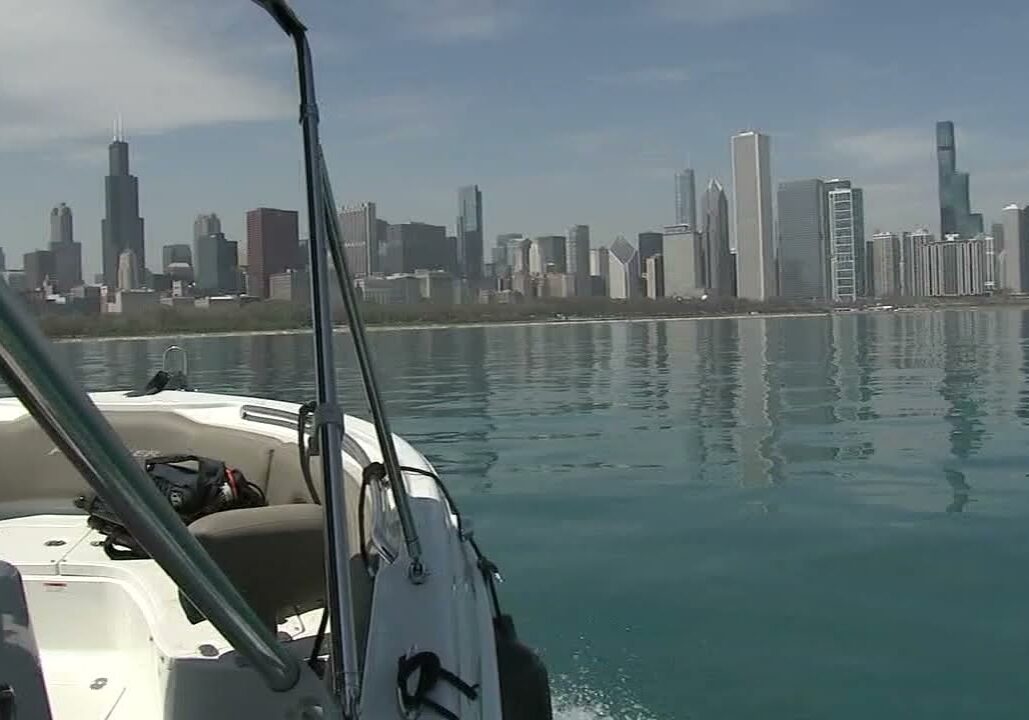 Boat on water with city skyline view
