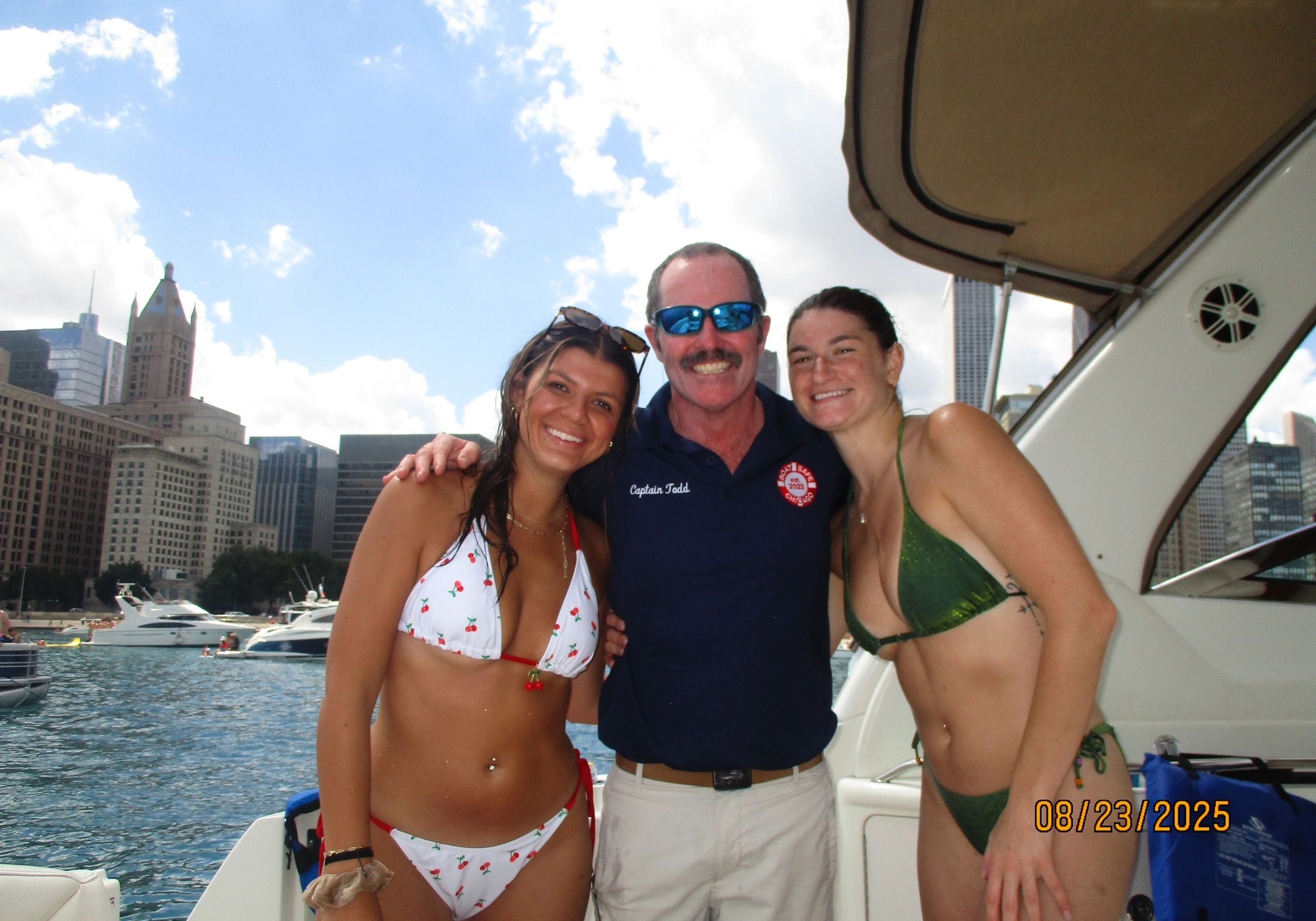 Happy friends enjoying boat trip