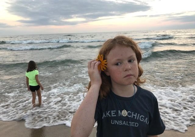 Sunset beach scene with children
