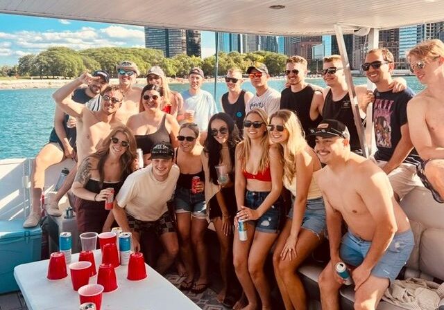 Friends celebrating on a yacht