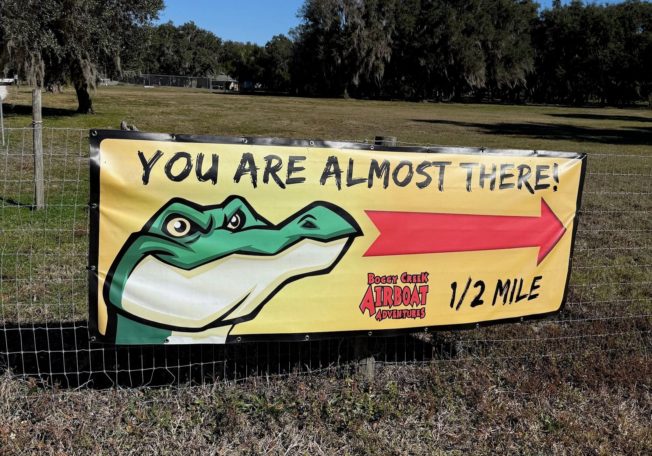 Amusement park sign directing visitors