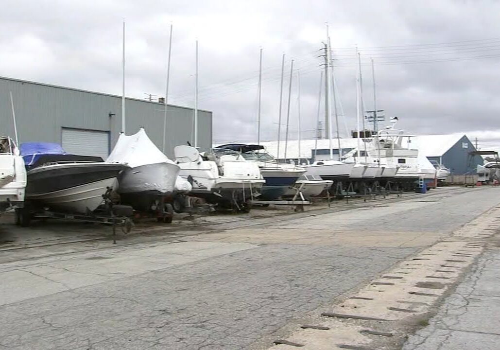 Marina with boats on dry land.