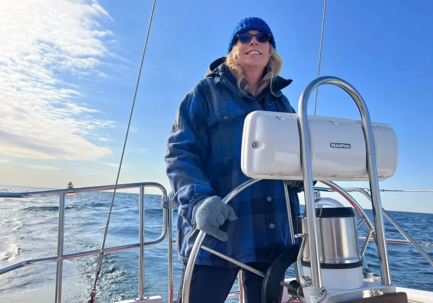 Woman enjoying sailing on open water