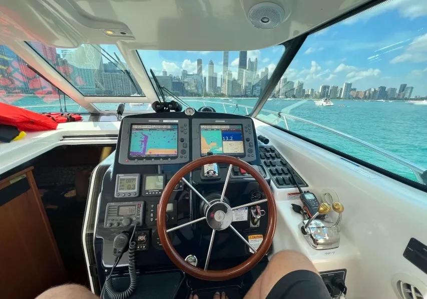 Boat cockpit with city skyline view
