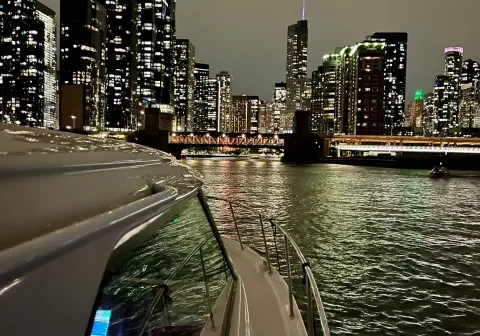 Nighttime cityscape view from a boat