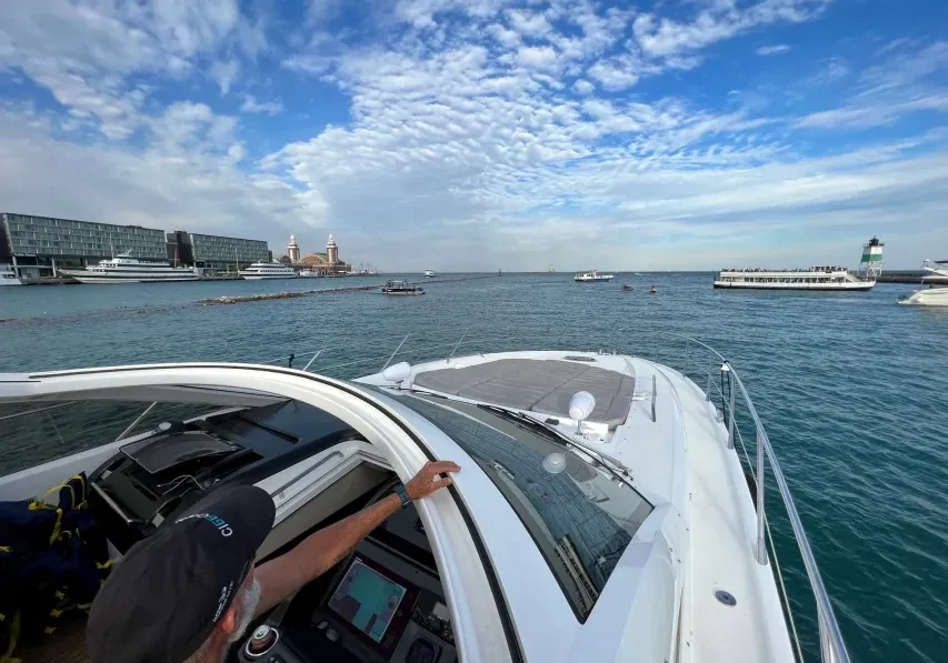 Person steering a yacht