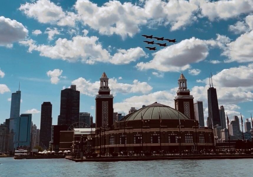 Jets flying above iconic cityscape