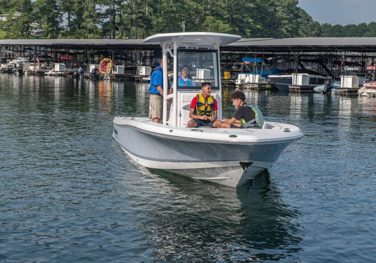 Small boat on lake near docks